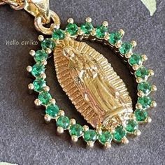 Our Lady Of Guadalupe  Virgin Mary Of Mexico  Gold Tone Oval Green Rhinestones  Necklace Pendant  18 inch Gold Plated Chain  Lobster Clasp Closure Comes in Gift Box and Organza Gift Bag Ships within 3 days. Will ship first class mail.  See our shop Hello Emiko for more beautiful handmade jewelry and gifts. Our Lady Of Guadalupe, Lady Of Guadalupe, Organza Gift Bags, Rhinestone Necklace, Gold Plated Chains, Our Lady, Virgin Mary, Necklace Pendant, Green And Gold