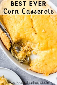 a casserole dish filled with mashed potatoes and topped with a serving spoon