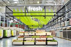 fresh produce is displayed in the store's large display area for customers to purchase