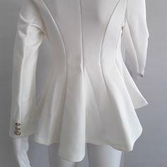 This New Jacket Has Lots Of Detail, It Has A Nehru Collar With Double Flap V-Cut Front, And Single Large Cover Button. Hi-Low Cut With Several Panels. Padded Shoulders And 3 Gold Tone Buttons On Each Sleeve. Pair With Anything, For A Special Or Causal, Would Be Amazing With Jeans. Made From Polyester. Measures Ptp 16" White Long Sleeve Party Outerwear, White Long Sleeve Blazer For The Office, White Long Sleeve Blazer For Office, Tailored White Outerwear For Party, Cream Long Sleeve Outerwear For Party, White Long Sleeve Outerwear For Office, Fitted White Outerwear For Work, Cream Long Sleeve Party Outerwear, White Party Outerwear With Button Closure