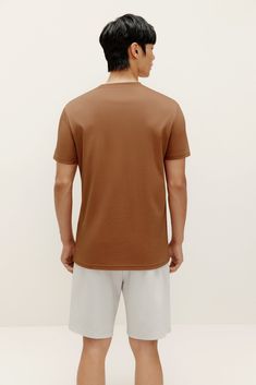 Lounge around or hit the town with our versatile Basic Short Sleeved T-Shirt, our take on a timeless classic with the perfect balance of polish and ease. Details Materials & Care Shipping & Returns • Short-sleeved, crewneck, finely woven for a smooth texture and durability. Size M is 28.9" in length.• A wardrobe staple equally perfect on its own or worn as an undershirt.• Made from 100% top-quality cotton: lightweight, soft, and breathable. • Material: 100% cotton.• Care instructions: Hand or ma Basic Shorts, Green Cotton, Smooth Texture, Timeless Classic, Wardrobe Staples, White Cotton, Men's Polo Shirt, Polo Ralph Lauren, Lounge