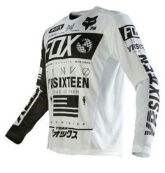 a white jersey with black and white designs on the chest, long sleeves and cuffs