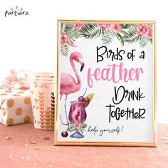 a pink flamingo party sign with gold trimmings and confetti cups