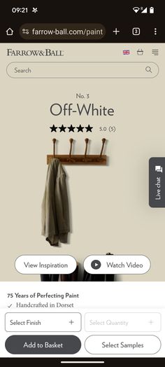 the off - white website is displayed on an iphone screen, with three coats hanging from hooks