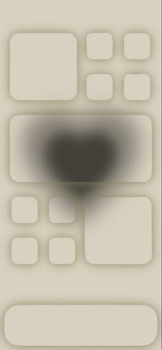 a blurry image of squares and rectangles in white, gray and black