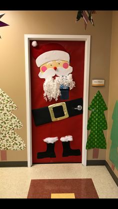 a door decorated to look like santa clause