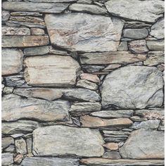 a stone wall that is made out of rocks