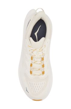 This all-purpose training shoe is updated with a single-layer mesh upper, a sock-like bootie and ghillie lacing to deliver a secure, well-balanced ride. The speckled regrind midsole and gum-rubber outsole are designed for lateral side-to-side movement so you easily transition from street to studio floors. Neutral: provides soft, even cushioning with an emphasis on comfort during any activity Lace-up style Removable insole Textile and synthetic upper/synthetic lining and sole Imported Breathable Beige Lace-up Running Shoes, Beige Breathable Lace-up Running Shoes, Beige Lace-up Running Shoes With Boost Midsole, Cream Running Shoes With Rubber Sole For Sports, Cream Sports Running Shoes With Rubber Sole, Cream Running Shoes With Rubber Sole, Beige Running Shoes With Laces, Beige Running Shoes With Laces For Sports, Beige Running Shoes For Sports