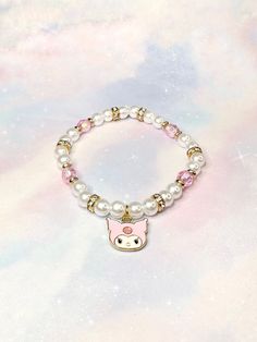 The Pink Kutie Bracelet is an adorable variation of KuromÍ's aesthetic while also being stylish & wearable. Made with accent iridescent pink beads, these beads shimmer and have hints of purple in certain lights.  The gold accents and rhinestones truly highlight the pinks within the bracelet ♡ ☾ ✧.* -6.5 inches (stretchy band) *.✧ ☾  ･ ｡ﾟ☆: *.☽ .* :☆ﾟ.  Handmade with love & moon magic ♡  ･ ｡ﾟ☆: *.☽ .* :☆ﾟ.  - (In CANADA) I ship through lettermail in order to provide free shipping and trying to ke White Kawaii Jewelry With Cute Design, Pink Beaded Kpop Bracelets, Pink Kpop Beaded Bracelets, Kpop Pink Beaded Bracelets, Cute White Hello Kitty Jewelry, Kawaii Jewelry With Cute Adjustable Design, Adjustable Kawaii Jewelry With Cute Design, White Kawaii Charm Bracelet Gift, Adjustable Cute Kawaii Jewelry