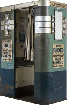 an old fashioned portable phone booth is shown