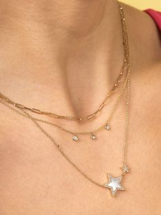 This delicate .13ctw diamond mini bezel necklace is on a 18" 14K gold chain with adjustable loops at 16" & 17". It is perfect for wearing everyday on its own or layered with another necklace or two. Available in 14K yellow, white or rose gold. Pearl And Diamond Necklace, Bezel Necklace, Everyday Luxury, Diamond Solitaire Necklace, Dangle Necklaces, Solitaire Necklaces, Bezel Set Diamond, Star Jewelry, Initial Jewelry