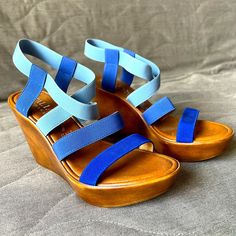 New Without Tag (Out Of Box)! Italian Shoemakers Two-Toned Blue Stretchy Straps With Wedge Platform Heel (4 Inches). Size 8. Blue Platform Sandals For Vacation, Casual Blue Wedge Sandals With Removable Insole, Blue Round Toe Wedge Sandals For Spring, Blue Sandals With Wooden Heel For Spring, Blue Open Toe Heels With Wooden Heel, Blue High Heel Wedge Sandals For Vacation, Blue Summer Platform Wedge Sandals, Blue Leather Wedge Sandals With Round Toe, Blue Casual Sandals With Wooden Heel