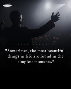 a man standing in front of a crowd holding his hands up with the words sometimes, the most beautiful things in life are found in the simple moments?