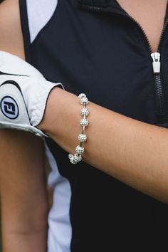 a close up of a person wearing a white glove