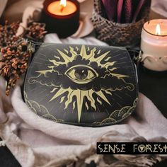 "Eye on Clouds Vegan leather Goth saddle bag, Boho witch crossed body purse, cute PU leather hand bag goth bag, hippies boho gift Small:  9.05\"(L) x 3.35\"(W) x 7.48\"(H) Large: 10.24(L) x 4.24\"(W) x8.66\" (H) .: 16.97 Oz. Made from high-grade Vegan leather with gold-tone hardware. .: Single zippered top inside closure, flap front closure with magnetic snap closure. .:Inner zipper pocket on back wall and a back zipper pocket. .:Cross body shoulder strap with adjustable length. .:Dimensions: 9.05\"(L) x 3.35\"(W) x 7.48\"(H). ❣️PRODUCTION and DELIVERY TERMS: This item will be shipped out from China The production takes 5-7  business days International delivery time is 10-20 business days. Ref :D2290143 Sense Forest would like to provide some clarity regarding the creation of our designs. Halloween Shoulder Bag Gift, Halloween Gift Shoulder Bag, Gothic Black Shoulder Bag For Festivals, Black Bohemian Shoulder Bag Gift, Gothic Satchel Shoulder Bag Gift, Gothic Crossbody Shoulder Bag As Gift, Gothic Crossbody Shoulder Bag For Gift, Gothic Style Satchel Shoulder Bag For Gift, Goth Bag