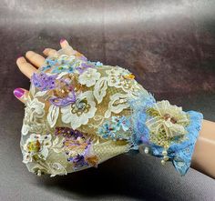 Enchanted Garden Beaded Lace Cuff- Bracelet: Step into a world of magic. Each stitch tells a story, with delicate floral patterns and whimsical butterfly accents in soft blues and purples.  Perfect for brides seeking a touch of whimsy, for a fairy-tale wedding, a special party, or anyone who loves to carry a bit of enchantment on their sleeve! PM for orders! ❤️ Bridal Bracelets, Lace Cuff Bracelet, Bridal Cuff, Classic Glamour, Lace Cuffs, Lace Gloves, Luxury Bridal, Fairy Tale Wedding, Bridal Bracelet