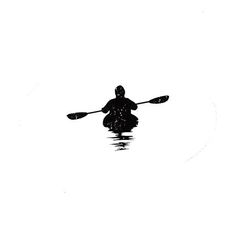 a person in a kayak paddling through the water with their paddles up