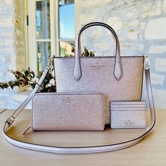 Guaranteed Authentic Brand New With Tags Attached. This Is An Option Listing You Can Buy Each Piece Or The Set Handbag & Wallet & Card Holder: $399 Handbag & Wallet: $350 Handbag & Card Holder: 325 Handbag: $250 Wallet: $199 Card Holder: $129 Kate Spade Glimmer Glitter Handbag/Wallet/Card Holder Option Gold Nwt Womens Satchel Details: Material: Smooth Glitter Fabric Zip Top Tote Metal Pinmount Logo Detachable Crossbody Strap Dimensions: 8"W X 9"H X 4d Wallet: Leather Imported 100% Polyester Lini Elegant Kate Spade Glitter Bags, Elegant Silver Kate Spade Bag, Kate Spade Luxury Silver Bag, Luxury Silver Kate Spade Bag, Elegant Everyday Bag With Sparkling Details, Luxury Glitter Bags For Everyday Use, Luxury Glitter Rectangular Bag, Elegant Everyday Sparkling Bag, Kate Spade Silver Bag For Everyday Use