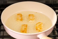 the food is being cooked in the pot on the stove top and ready to be eaten