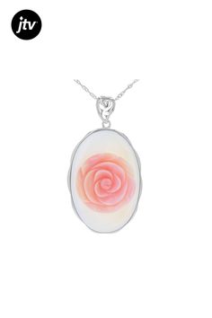 Pacific Style��� 45x30mm Hand Carved Pink Conch Shell Rhodium Over Silver Fancy Rose Slide Pendant with 18" Chain.  Measures approximately 2.32 "L x 1.27"W. 3.5mm bail. Lobster claw clasp. 2" extender. Pink Flower Pendant Jewelry With Rose Design, Pink Rose Pendant Jewelry, Pink Rose Design Pendant Necklace, Rose Oval Jewelry With Rose Design, Oval Rose Jewelry With Rose Design, Formal White Jewelry With Rose Design, Formal White Rose Design Jewelry, Rose Pendant, Pendant With Chain