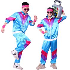 two men dressed in colorful clothing and sunglasses, one holding a boombox on his head