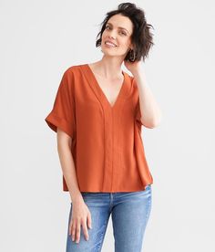 Women's Oversized Woven Top In Orange By Daytrip., Women's Mango Textured dolman v-neck top Cuffed sleeves Bust measures 48 on size small Body length 23 on size small. 97% Polyester 3% Spandex. Machine wash cold gentle cycle with like colors. Do not bleach. Tumble dry low. Cool iron if necessary.. Measurements: Bust -Fullest part of bust with arms at sides. Waist -Circumference of natural waist: above belly button below rib cage. Hips -Standing with feet together fullest part of hips. WOMEN'S TO Easter Fashion, Top For Women, Woven Top, Women Shirts Blouse, Shirts Blouses, Women's Shirts, Rib Cage, Cuff Sleeves, V Neck Tops