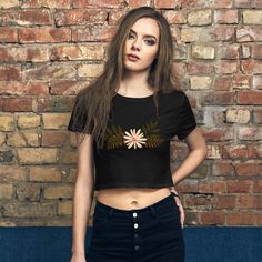 The season's trendiest garment - the crop top. This top is tight-fitting but still incredibly comfortable, and it hits just above the navel.  * 52% combed ring-spun cotton, 48% polyester * Fabric weight: 3.6 oz/yd² (122 g/m²) * 40 singles * Slim fit * Side-seamed construction * Blank product sourced from Nicaragua, the US, or Honduras This product is made especially for you as soon as you place an order, which is why it takes us a bit longer to deliver it to you. Making products on demand instead of in bulk helps reduce overproduction, so thank you for making thoughtful purchasing decisions! Handmade Fashion, Crop Tee, Nicaragua, Honduras, Womens Clothing Tops, On Demand, Boho Fashion, Fabric Weights, Polyester Fabric