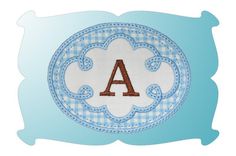 a blue and white monogrammed pillow with the letter a in it's center