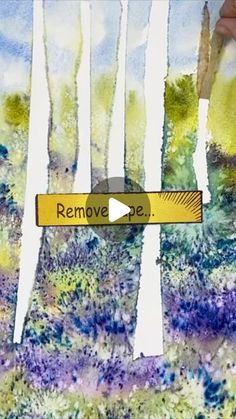 someone is painting trees in the woods with watercolors on paper, and then they are