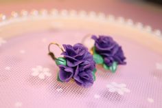 Cute purple rose floral polymer clay earrings/ elegant floral earrings/ beautiful realistic earrings  ---------------------------------------------- This cuties are made by me☺️ Polymer clay earrings is a great choice as it's unique , lightweight and it's easy to wear! They are perfect for any occasion!  As the pieces are handmade, small differences    may occur compared to the presented pictures and has some small imperfections.  Keep in mind that the polymer clay earrings are durable and slightly flexible so it shouldn't be bent or dropped. If it needs to be cleaned, just use the wet or dry cloth  Hope you'll enjoy wearing this little cuties as much as I do! Realistic Polymer Clay, Floral Polymer Clay, Earrings Elegant, Purple Rose, Floral Earrings, Elegant Floral, Purple Roses, Elegant Earrings, Flower Earrings