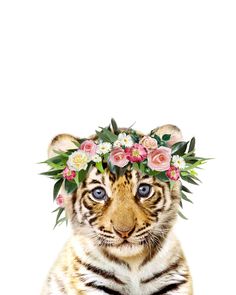 a tiger wearing a flower crown on top of it's head and looking at the camera