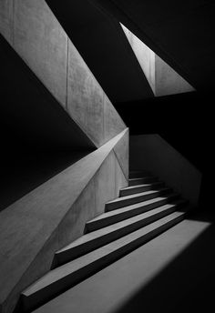 black and white photograph of stairs in an empty building