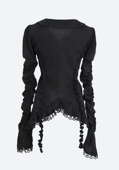 Venture into the shadows with the Goth Asymmetric Ruched Sleeve Blouse. This creation blends the enigmatic allure of goth culture with intricate ruffles, sophisticated button closures, and ethereal lace adornments. Its dramatic flare cuffs and plunging V-neck carve out a niche in any avant-garde wardrobe, perfect for those who court the night in style. Goth aesthetic Ruffled design Button fastening Lace details Flare cuffs V neck Long sleeve Cotton Gothic Black Top With Lace Collar, Witchy Long Sleeve Tops For Party, Witchy Long Sleeve Party Tops, Gothic Tops With Lace Trim For Fall, Gothic Ruffled Blouse For Spring, Spring Gothic Blouse With Ruffles, Halloween Party Top With Ruffles, Halloween Party Ruffle Top, Elegant Fitted Halloween Blouse