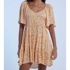 Made Of Airy Crinkle Fabric, This Floaty Floral Babydoll Dress Has All The Pretty Details: Flutter Sleeves, A V-Neck, And A Tiered Ruffle Skirt. Crinkle Viscose Fabric. Floaty Fit. V-Neck. Flutter Sleeves. Tiered Ruffles At Skirt. 100% Viscose. New With Tags! I Try To Ship Same Day Casual Billowy Floral Print Dress, Flowy Ruffled Floral Dress For Beach, Flowy Short Sleeve Sundress For Brunch, Flowy Rayon Mini Dress With Ruffles, Summer Flowy Tiered Floral Dress, Flowy Flutter Sleeve Summer Mini Dress, Billowy Short Sleeve Mini Dress For Summer, Billowy Floral Print Dress With Short Sleeves, Billowy Short Sleeve Floral Print Dress