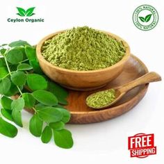 green tea powder in a wooden bowl and spoon