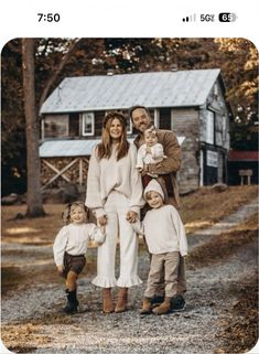 a family posing for a photo in front of a house with the caption that reads,