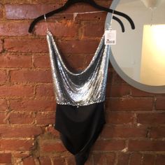 This Top Is A Super Sexy Backless Body Suit. It’s Shiny Sequin/Metal And Is Perfect For New Years Or The Club. Nwt Never Worn Chic Bodysuit With Built-in Bra For Night Out, Elegant Sequined Bodysuit For Night Out, One-piece Bodysuit With Built-in Bra For Night Out, Glamorous Bodysuit For Evening Party Season, Glamorous Evening Bodysuit, Chic Sequined Bodysuit For Evening, Chic Sequined Evening Bodysuit, Chic Evening Bodysuit With Sequins, Chic Evening Sequined Bodysuit