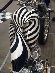 a motorcycle with black and white stripes on it