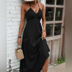 Black Long Summer/Vacation Dress. Never Worn Black Casual Beach Midi Dress, Casual Black Maxi Dress For Day Out, Black Halter Neck Dress For The Beach, Black Casual Midi Dress For Vacation, Casual Black Midi Dress For Vacation, Black Summer Vacation Dress, Casual Black Dresses For Vacation, Black Casual Vacation Dresses, Casual Black Vacation Dresses