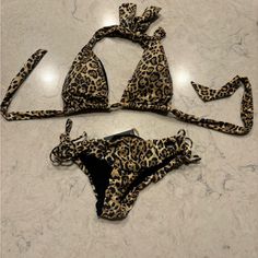 Brand New Sexy Bikini Leopard Print Leopard Print Halter Neck Swimwear For Swimming, Brown Stretch Swimwear For Pool, Fitted Leopard Print Swimwear For Vacation, Stretch Brown Swimwear For Pool, Summer Brown Swimwear With Tie-side Bottom, Brown Triangle Top Swimwear For Pool, Brown Stretch Beachwear Swimwear, Summer Brown Tie-side Swimwear Bottom, Brown Halter Neck Swimwear