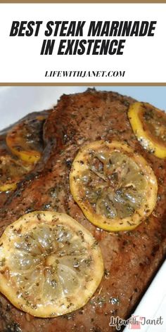 steak with lemons and herbs on top in a white dish text overlay reads best steak marinade in existence