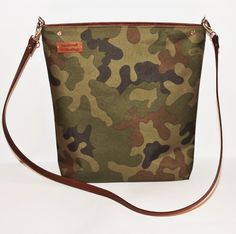 "UniQueBags handbags store offers: Military style crossbody bag, made of waterproof and durable strong tactical fabric. The interior is made of alcantara suedette, there are two slip pockets. The whole closes by strong metalzip. The strap of the bag is attached with carabiners, it is made of the highest quality Italian eco leather-this gives the bag a slightly more elegant look. The bag keeps its shape without filling, the bottom is additionally solidly stiffened. Dimensions of the bag: 34/35/8c Outdoor Military Satchel Bag, Military Style Satchel Bag For Outdoor, Military Style Outdoor Satchel Bag, Military Style Satchel For Outdoor, Military Travel Bags With Adjustable Strap, Military Style Rectangular Bag For Everyday Use, Military Style Travel Bag With Adjustable Strap, Military Style Bags With Adjustable Strap For Outdoor, Military Style Outdoor Bag With Adjustable Strap