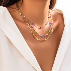 Description:Chic Layered Colorful Enamel Heart Chain Choker Necklace Set Specification:Size: 13.8" - 17.7"Weight: 0.62 oz/setMaterial: Copper. EnamelStyle: Bohemia Features & Details:This layering enamel heart chain choker necklace set is lead-free. nickel-free. cadmium-free and hypoallergenic. Don't worry about allergies to the sensitive skin or discomfort to your health. which you could wear it with confidence for a long time.This necklace set for woman is decorated with retro design and superb craftsmanship to create special piece that can satisfy any jewellery lovers. making you more attractive and charming.It is easy to match your different outfits and also suitable for any occasions like wedding. banquet. costume party. engaged party. prom. anniversary. holiday. evening party or othe Multicolor Metal Chain Necklace As A Gift, Multicolor Metal Chain Necklace For Gifts, Colorful Chain Jewelry As Gift, Colorful Chain Jewelry For Gifts, Colorful Chain Necklace For Gifts, Multicolor Metal Charm Necklace With Adjustable Chain, Colorful Metal Necklaces For Gifts, Colorful Metal Necklaces As Gift, Multicolor Adjustable Chain Necklace Gift