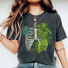 Skeleton Plant Body T-shirt, Plant Lover Shirt, Plant Gift, Plant Lover Gift, Plant Mom, Monstera Tee, Plant Graphic Shirt, Plant Lady Gift 📢Please Check All Photos For Details.   📢Choose Your T-Shirt Size From The Drop-Down Lists Next To The item Picture   📢Choose Of Your T-Shirt Color From The 2nd Picture   📢Use "Add message to Seller" link On The Checkout Page To Send me the Following important Details For Your Order's Customization.   📢Shipping Time Varies by location (we are located in Plant Graphic, Plant Gift, Plant Lover Gift, Plant Mom, Mens Long Sleeve Tee, Plant Lady, Plant Gifts, Graphic Shirt, Plant Lover