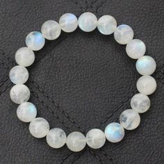 "Material- white rainbow Gemstone Color- White bracelet length- 7-7.5inch beads size- 4,6,8,mm Shape- Round About this item The bracelet shown is 7-7.5\" size which fits an average wrist but if you have a different wrist size you can message us we will custom make your order This is a stretch fit bracelet, allowing for easy on-off fitment over the hand Sell Unit 1 bracelet, beads size 4,6,8, mm fully stretchable bracelet Direct from Jaipur-India, Best Price, Hand select, Nice Quality Size, Weight & Colour are approximate and may slightly vary Stone: Natural moonstone (no dyed, no color enhanced, Natural crystal/gemstone Moonstone is a stone of inner growth and strength; It is believed to help soothe emotional instability and stress, and stabilize the emotions, providing calmness; Moonstone Moonstone Gemstone Beads Bracelets For Meditation, Spiritual Moonstone Beaded Bracelets With Natural Stones, Moonstone Gemstone Beaded Bracelet As Gift, Spiritual Hand-strung Moonstone Bracelets, Moonstone Beaded Bracelets For Meditation, Spiritual Moonstone Beaded Bracelets With Gemstones, Hand-strung Moonstone Beaded Bracelets For Meditation, Moonstone Beads Jewelry Gift, Moonstone Round Beads Jewelry For Healing