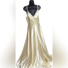 - Polyester Light Yellow Gown - Zipper In Back - Size 7 - Has Pockets ! - New With Tag Yellow V-neck Maxi Dress For Wedding, Fitted A-line Yellow Evening Dress, Yellow Fitted A-line Evening Dress, Fitted Yellow A-line Evening Dress, Yellow A-line Maxi Dress For Wedding, Yellow Fitted Satin Gown, Yellow Satin Party Gown, Yellow Satin Gown For Party, Yellow V-neck Maxi Dress For Formal Occasions