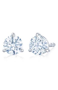 Round brilliant-cut diamonds are prong set on bright platinum posts in timeless stud earrings that make an elegant addition to your collection. Post back Total diamond weight: 0.70ct. Clarity: H–I Color: SI1–SI2 Platinum/diamond Made in USA >Diamond Guide Diamond Guide, Round Brilliant Cut Diamond, Round Cut Diamond, Diamond Earrings Studs, Brilliant Cut Diamond, Diamond Studs, Round Brilliant, Prong Setting, Made In Usa