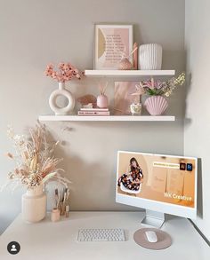 a desktop computer sitting on top of a white desk