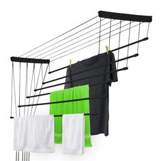 clothes hanging on the clothes line with green and white towels in front of them, against a white background