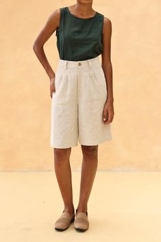 The linen loose-fitted knee-length shorts offer a comfortable and casual fit, perfect for warm days. Handcrafted in our studio to your measurements and preferences, available in over 60 colors. DETAILS - 100 % linen, medium weight (200gsm), free-shrinkage, amazingly soft feel - Knee-length shorts; different length is possible - Loose fit - High waisted - Pleated front - Front button and zipper - Inseam pockets - Custom made pants, FREE customizations; simply let us know your needs (hem length, fit style, leg opening width, belt, etc.). - Handcrafted in our studio, French seams, clean and meticulous COLOR - The color shown is Beige. - Available in over 60 colors, choose color in the color chart in the listing. - Link of fabric samples available here: https://madebygaiavn.etsy.com/listing/13 Summer Wide Leg Shorts With Built-in Shorts, Linen Bermuda Shorts With Built-in Shorts And Relaxed Fit, Beige Linen Bottoms With Built-in Shorts, Knee-length Bottoms With Pockets For Vacation, Knee-length Bottoms With Built-in Shorts For Vacation, Knee-length Vacation Bottoms With Pockets, Knee-length Vacation Shorts For Summer, Knee-length Summer Vacation Shorts, Beige Linen Shorts For The Beach